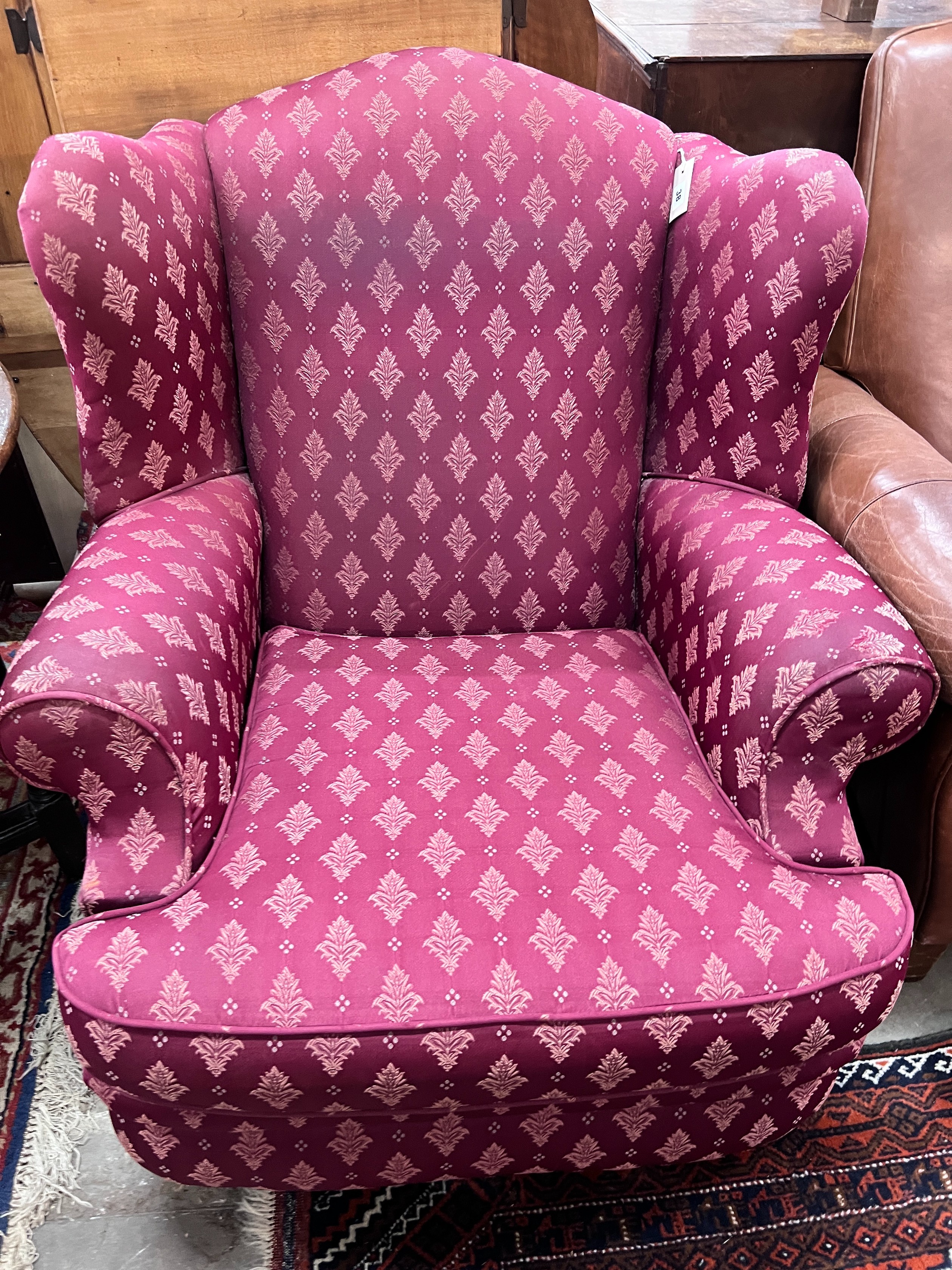 A Victorian style upholstered armchair, width 90cm, height 100cm *Please note the sale commences at 9am.
